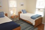 First floor bedroom with two twin beds